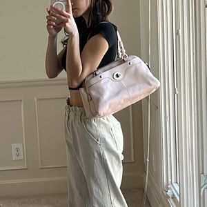 -used -has paint marks on the bottom -inside has a very pretty good interior